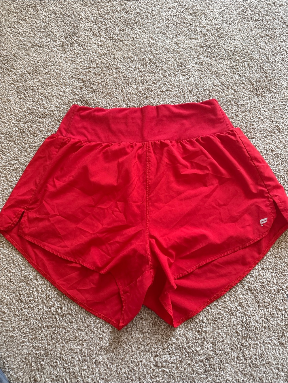 Red Fabletics running shorts. Built in spandex shorts. Womens size small.